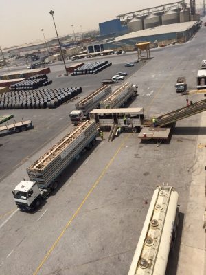 Livestock trucks lined up on the apron for loading
